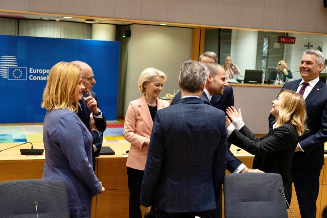 President Meloni greets other leaders before the European Council working session