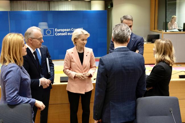 President Meloni greets other leaders before the European Council working session